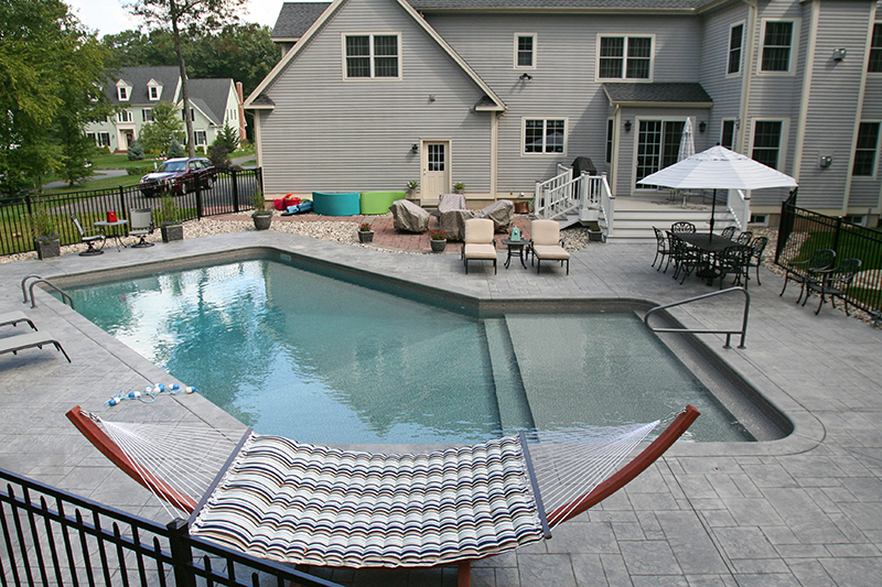 Swimming pool and stamped concrete project example 64